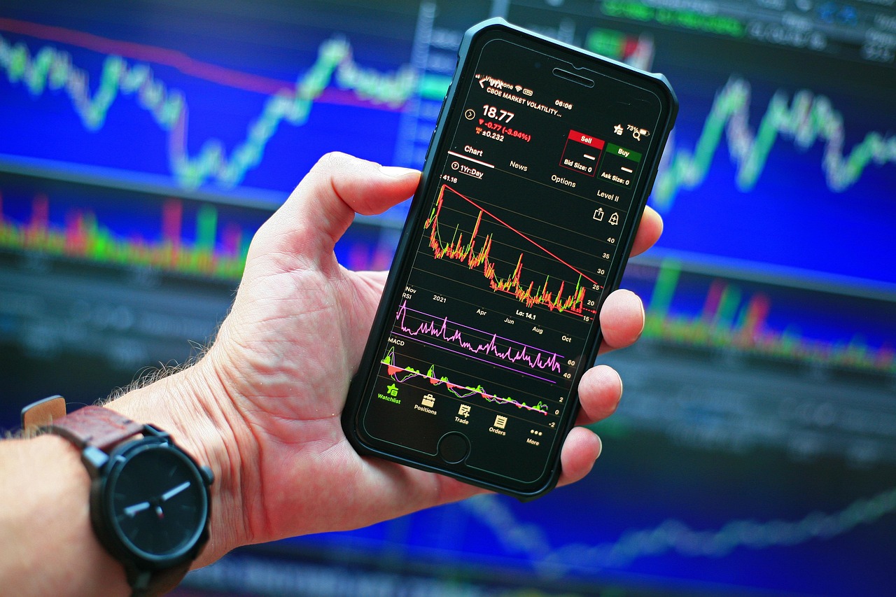 Market data screen showing rapid price movement — the closing line aggregates every public information signal the market has by kickoff
