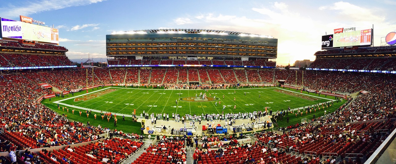 Football scoreboard showing late-game score — key numbers are the margins games land on most often